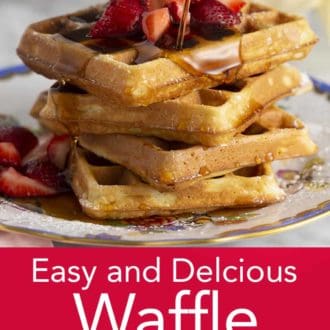 stack of waffles on a plate topped with strawberries