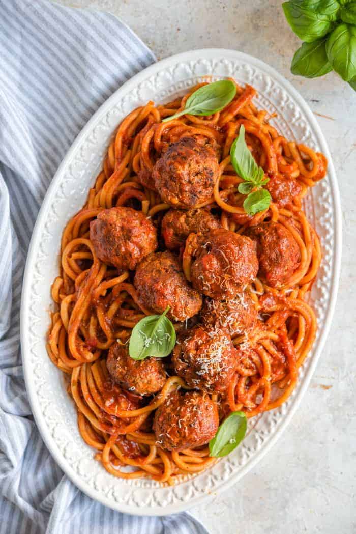 An overhead shot of instant pot spaghetti and meatballs on a serving platter