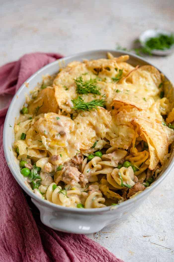 A close up of a tuna casserole with a scoop out