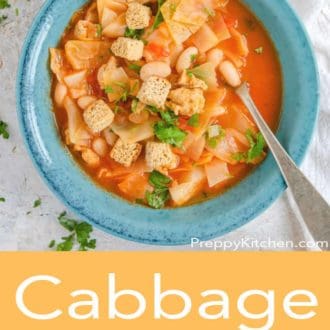 cabbage soup in a blue bowl with a spoon