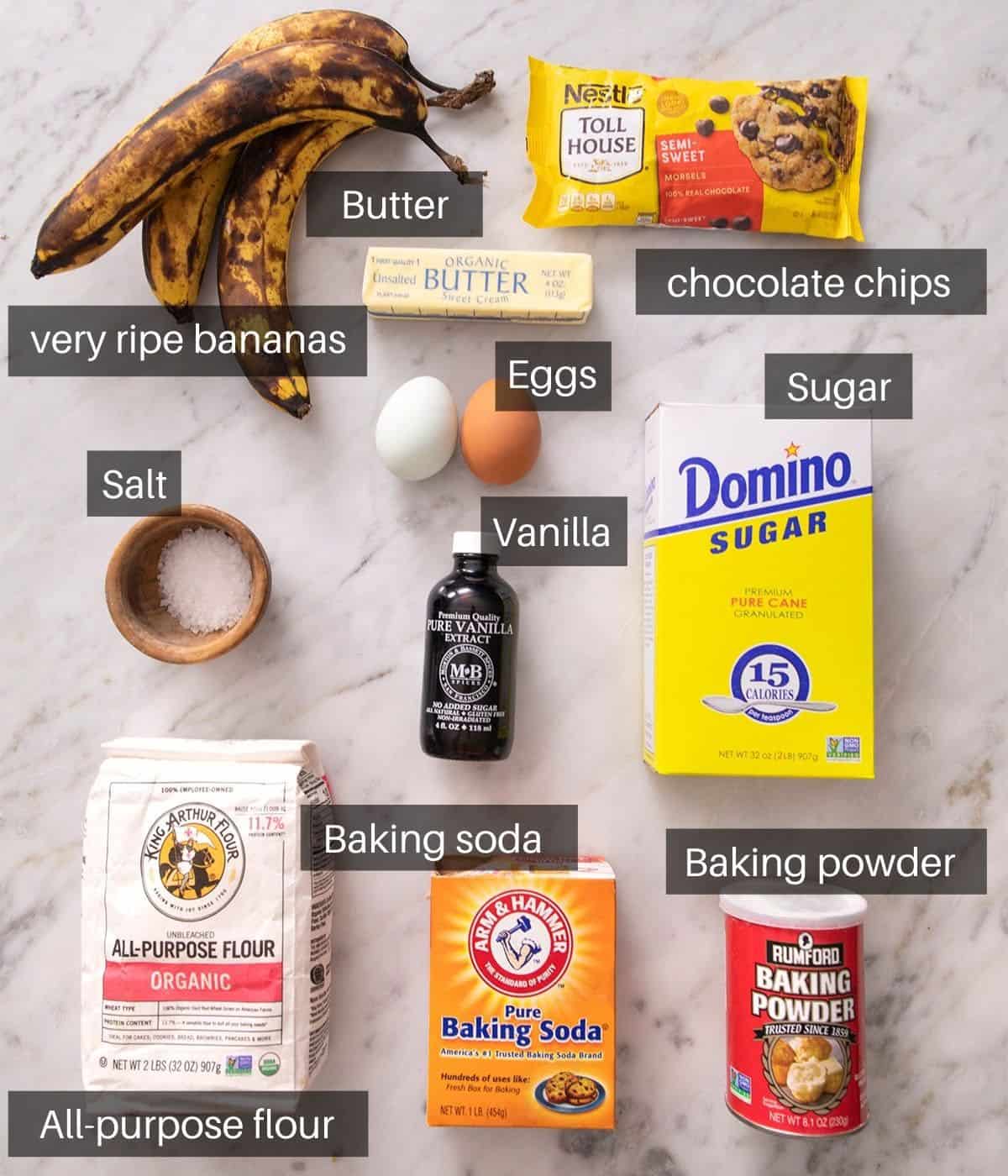 An overhead shot of all the ingredients you need to make chocolate chip banana bread.