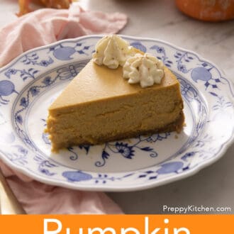 A piece of pumpkin cheesecake on a blue and white plate.