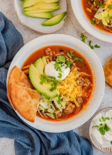 An overhead shot of taco soup in two bowl