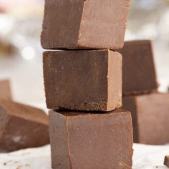 Pinterest graphic of a stack of chocolate fudge.