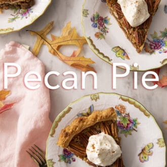 Three pieces of pecan pie on plates.