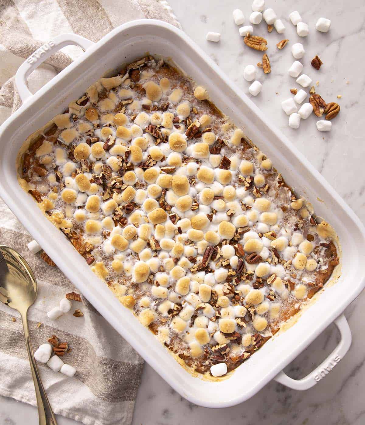 A sweet potato casserole topped with golden marshmallows.