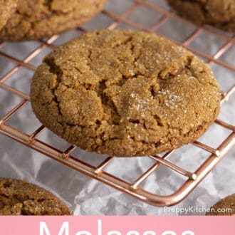 Pinterest graphic of molasses cookies on a cooling rack.