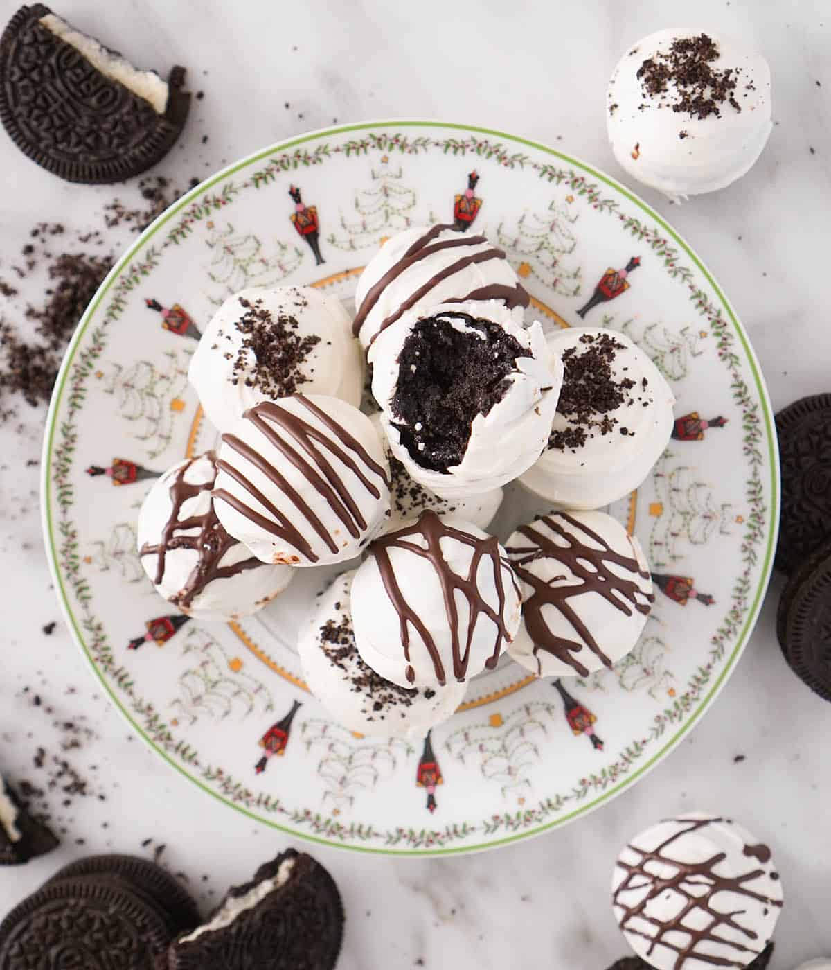 A Christmas plate filled with Oreo balls.