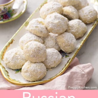 several russian tea cakes on a porcelain tray