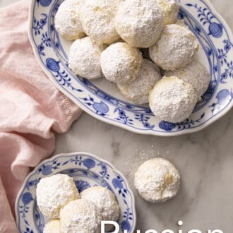 russian tea cakes on a blue and white patterned plate