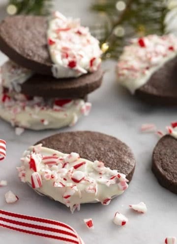 Chocolate sugar cookies dipped in white chocolate and sprinkled with crushed candy canes.