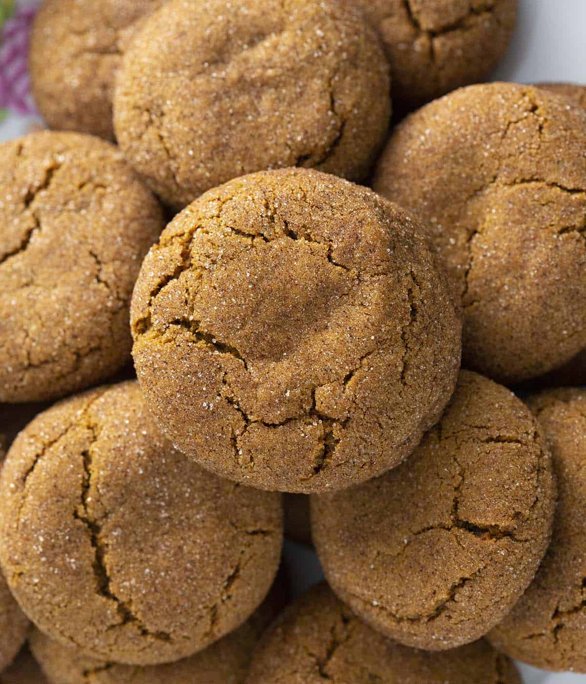 Ginger snap cookies close up showing the sugar they're been coated with.