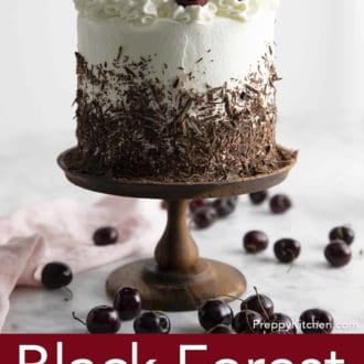 black forest cake on a wooden cake stand