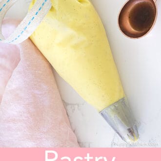 A piping bag filled with vanilla pastry cream.