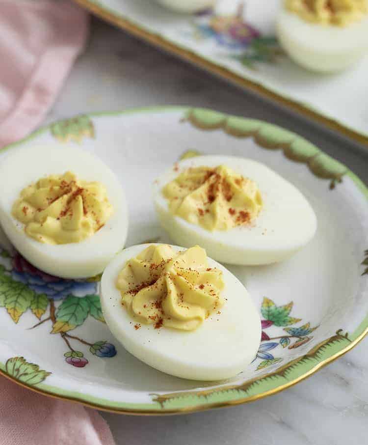 Deviled eggs piped with a creamy, perfectly spicy filling.