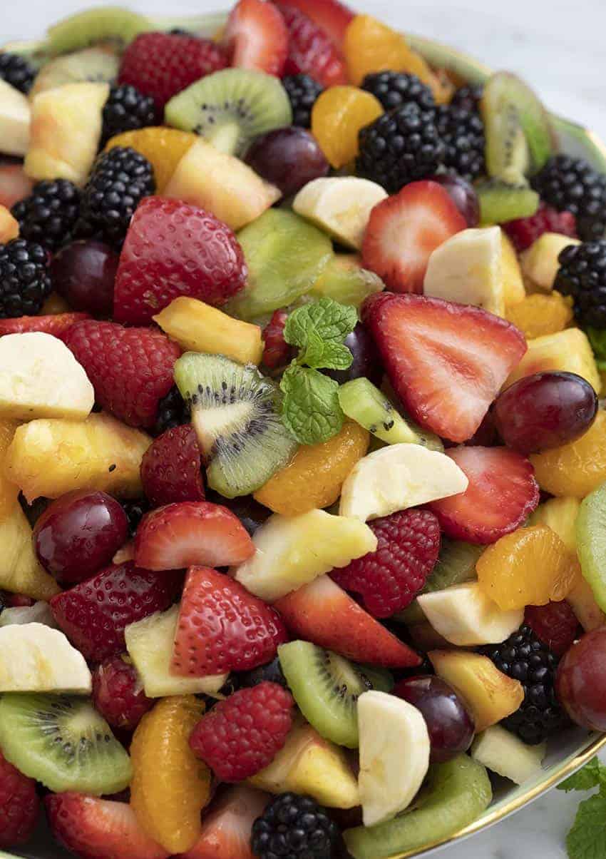 A large bowl filled with homemade fruit salad.