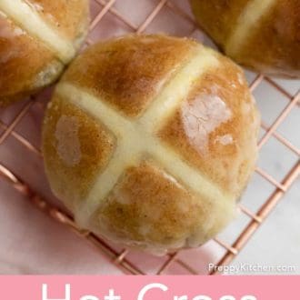 hot cross buns on a cooling rack