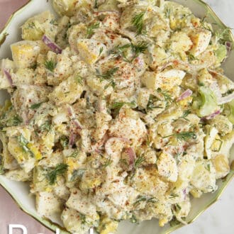 A potato salad in a round serving dish.