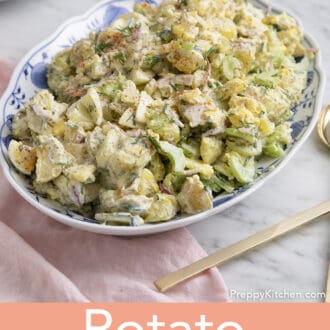 Potato salad in a blue and white serving dish.