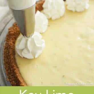 whipped cream dollops on key lime pie in a glass pie dish