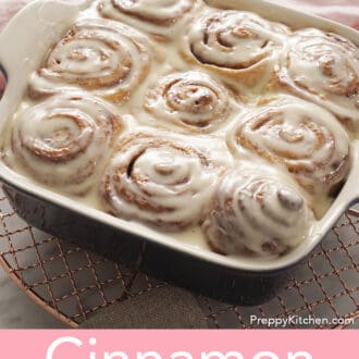 Cinnamon Rolls with glaze in a square baking dish.