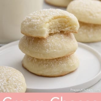 cream cheese cookies stacked on a plate