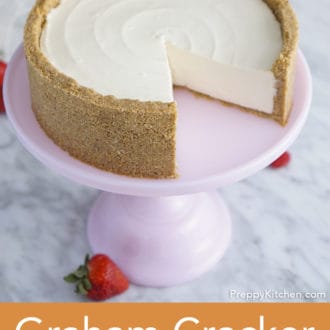 cheesecake with graham cracker crust on pink cake stand