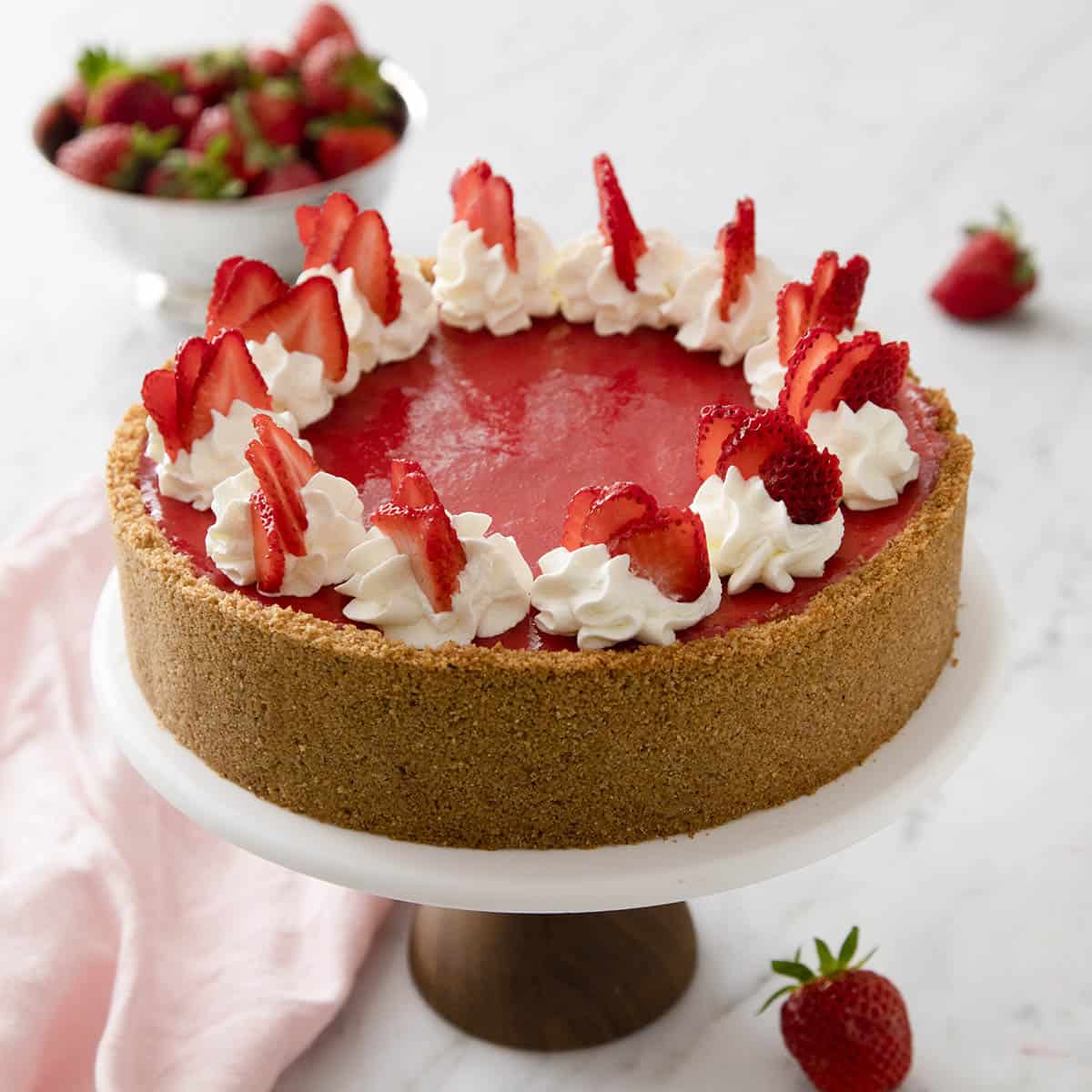 A no bake strawberry cheesecake with a Graham cracker crust.
