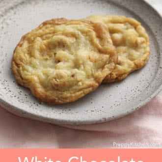 Pinterest graphic showing two white chocolate macadamia cookies on a plate.