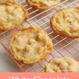 Pinterest graphic showing white chocolate macadamia cookies on a cooling rack.
