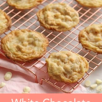 Pinterest graphic showing white chocolate macadamia cookies on a cooling rack.