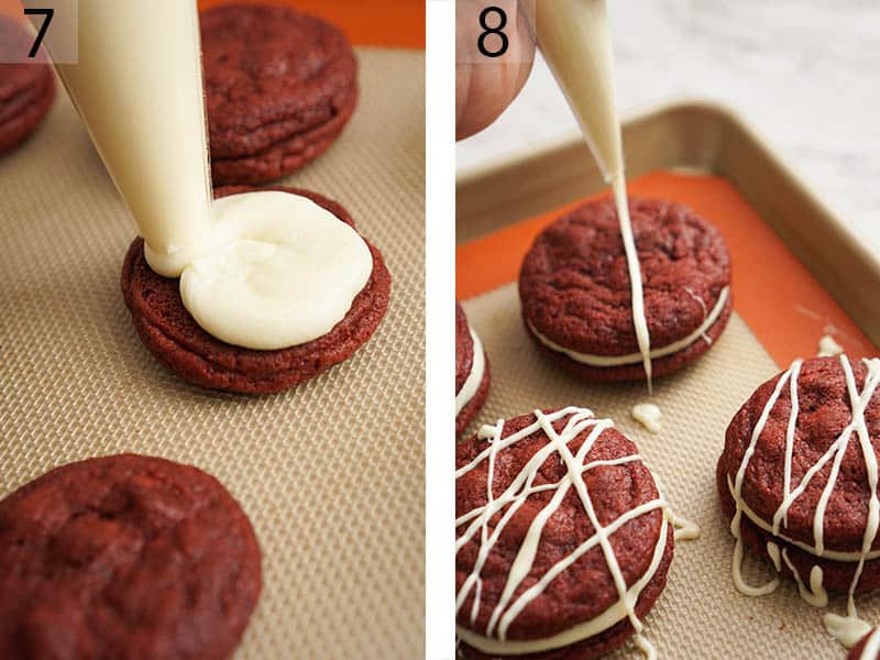 Red velvet cookie sandwiches being filled with cream cheese frosting.