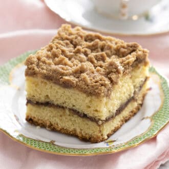A piece of coffee cake with a ribbon of cinnamon filling through the center.