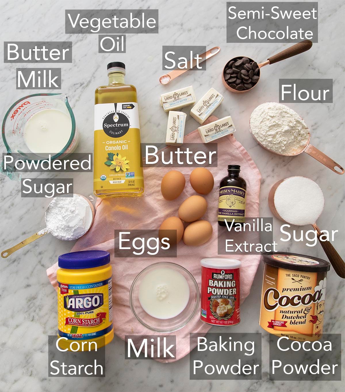 Ingredients for making a Yellow Cake on a counter.