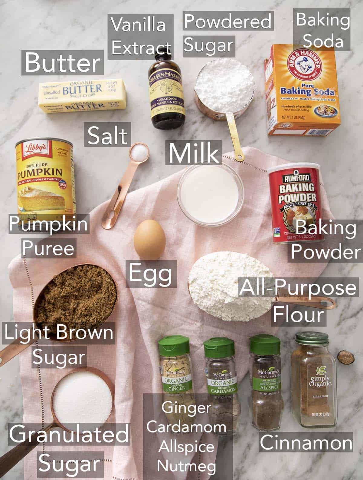 Ingredients for making pumpkin cookies on a counter.