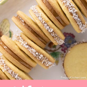 Alfajores cookies on a porcelain serving tray.