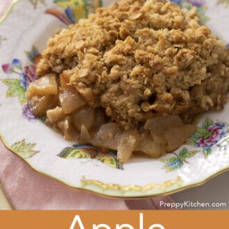 Pinterest graphic of an apple crisp on a Herend plate.