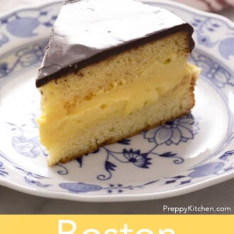Boston cream pie on a blue and white plate.