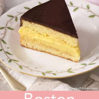 Boston cream pie on a plate with leaves.