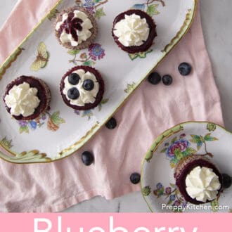 Six mini blueberry cheesecakes on a table