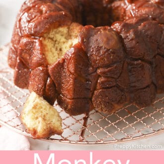 A monkey bread loaf with a piece taken out.