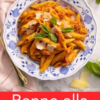 Penne alla vodka on a blue and white plate.