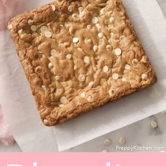 Pinterest graphic of freshly baked blondie before getting cut into bars.