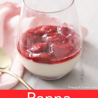 A stemless wine glass filled with panna cotta.