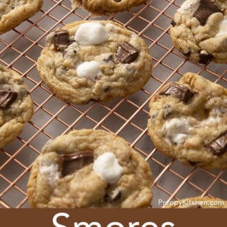S'mores cookies cooling on a copper rack.