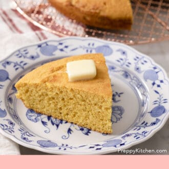 Pinterest graphic of a wedge-shaped piece of cornbread on a blue and whhite plate.