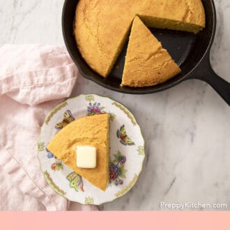 Pinterest graphic of a top-down photograph of cornbread in a skillet with a slice on a plate beside it.
