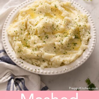 Pinterest graphic of mashed potatoes topped with finely chopped herbs.