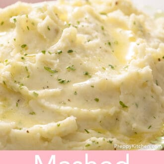 Pinterest graphic of a close up view of mashed potatoes. Finely chopped herbs on top.