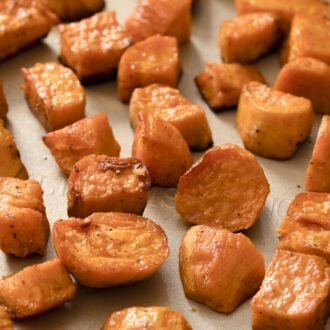 Roasted sweet potatoes on a sheet pan